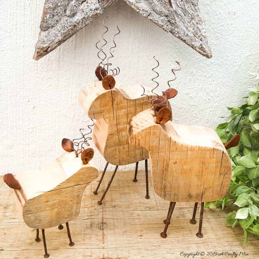 Easy DIY Rustic, repurposed Reindeer Family Ornaments - a lovely way to use up those old rusty nails and add something special to your festive decor Great gift idea too! #woodenreindeer #DIYReindeer #DIYRustyReindeer #RustyNailrepurpose #acraftymix # Reindeerdecor #reindeertemplate