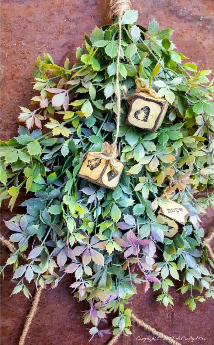 Add a few DIY Square Ornaments to the star wire wreath #WireWreathFrameDIY #EasyStarWreath #aCraftyMix #HowtoWireWreath #StarWireWreath