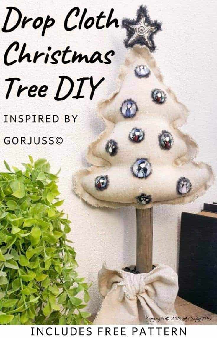 This Gorjuss inspired drop cloth Christmas tree doesn't even take an hour to make and it can be reused as a scatter cushion when the decorations come down. Perfect decor for small spaces #gorjuss #gorjussart #gorjussgirl #santorogorjuss #acraftymix #dropclothrepurpose #dropclothChristmas #dropclothDIY #dropclothcrafts #freepattern