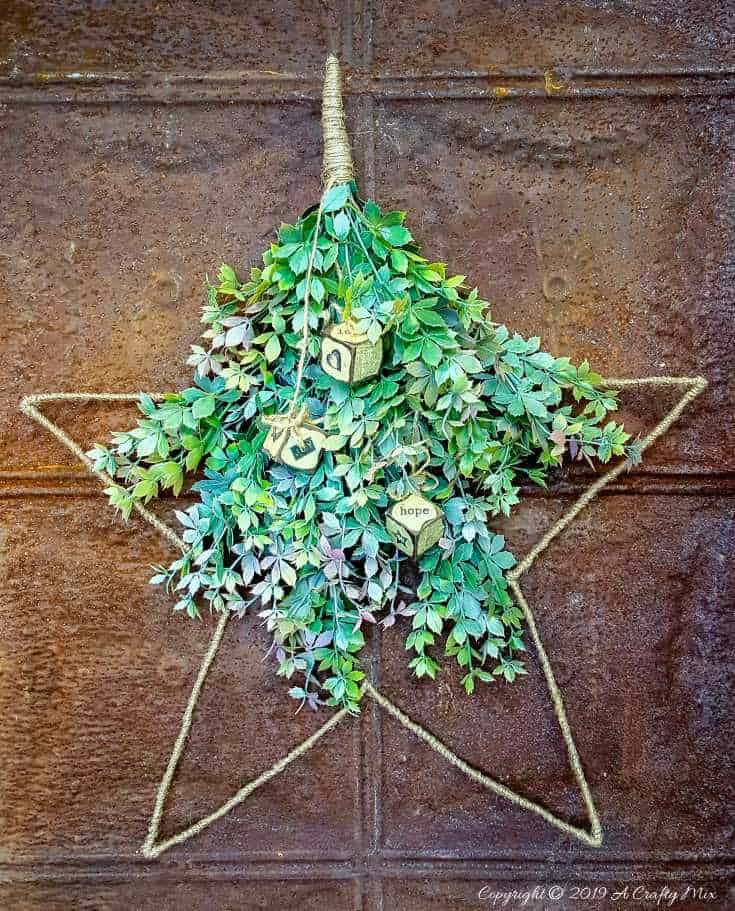 If you struggle to find a star wire wreath frame you can make your own using this easy to follow tutorial. #WireWreathFrameDIY #EasyStarWreath #aCraftyMix #HowtoWireWreath #StarWireWreath