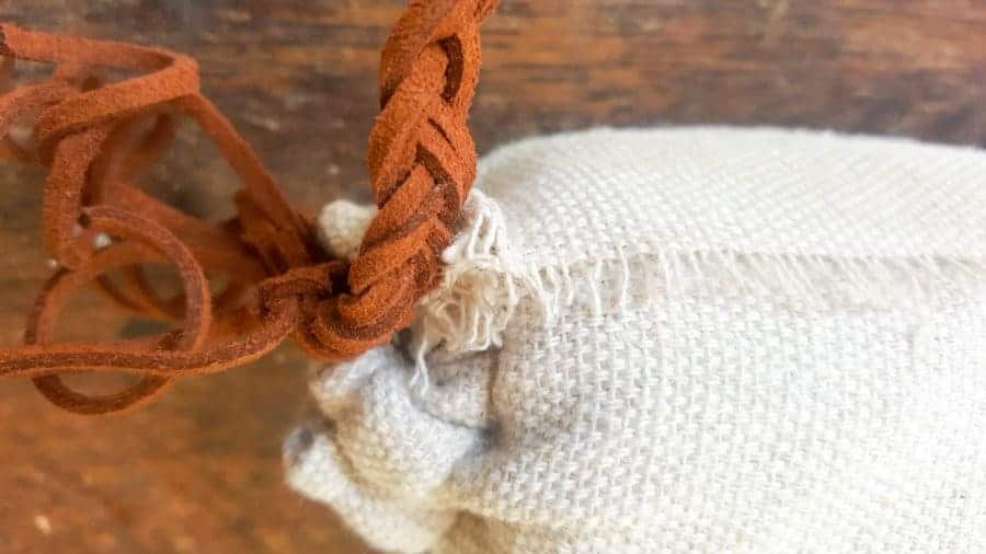 Tie the leather strips to the bottom of the quiver #VintageValentine #TinCanRecycle #ValentineGiftIdea #QuiverArrows #AcraftyMix #HomeDecor #MacrameArrow