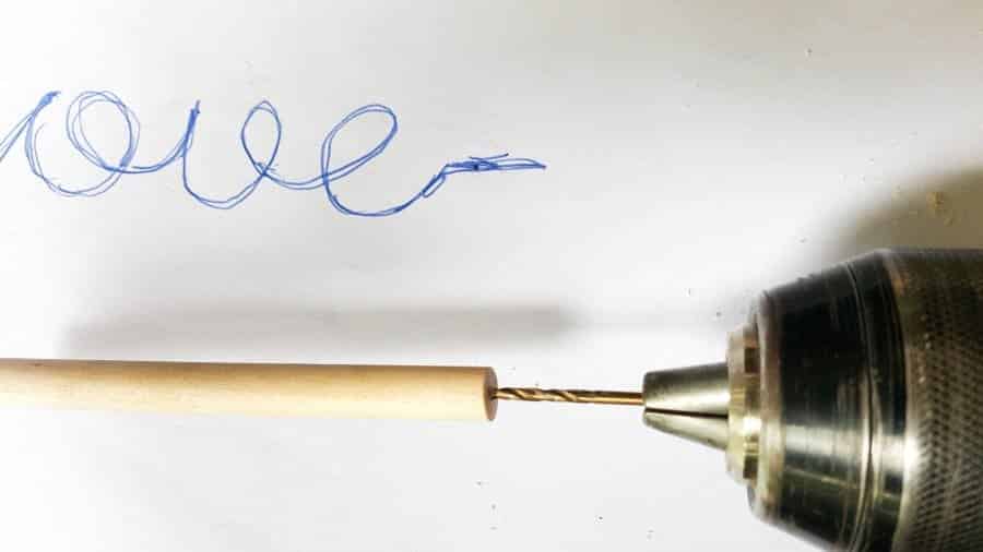 Drill a small hole in the dowel sticks #gallerywall #acraftymix #valentinesday #lovearrow #bohodecor #lovedecor #DIYArrowdecor #ArrowPrintable #arrowDIY #arrowcrafts #DIYWirewords