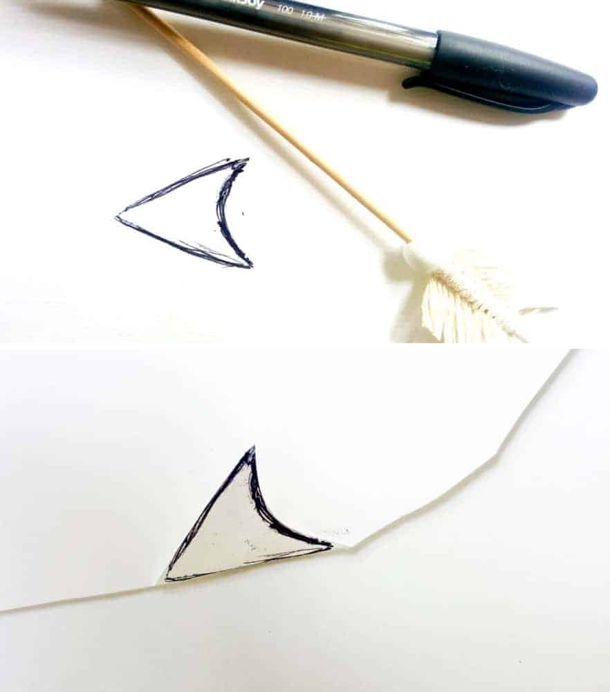 Drawing up a template for the arrowheads using the skewer #VintageValentine #TinCanRecycle #ValentineGiftIdea #QuiverArrows #AcraftyMix #HomeDecor #MacrameArrow