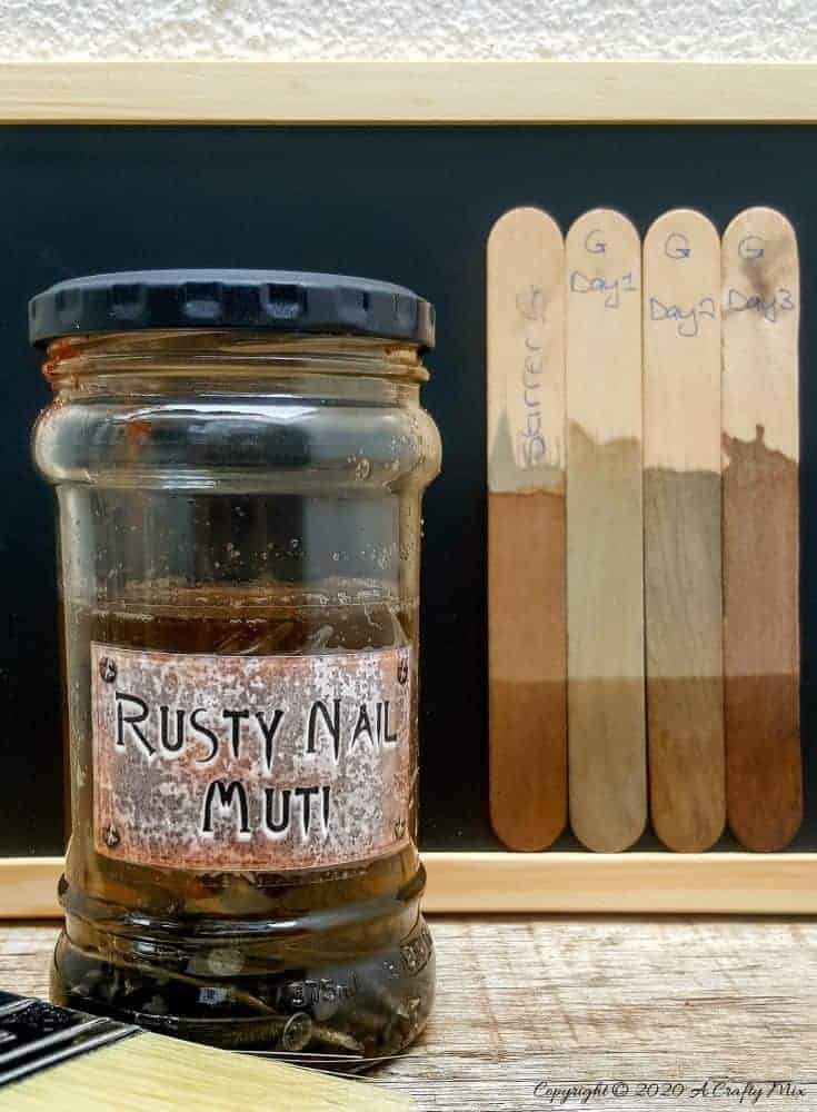 Looking for an all natural aging wood stain recipe that’s budget friendly and easy to make? Then you have to try Rusty Nail Muti. It transforms new wood into old and weathered in minutes and by making a few small adjustments you can control the color and intensity too #Naturalwoodstain #DIYWoodStain #Agingwoodstain #acraftymix #rustynail