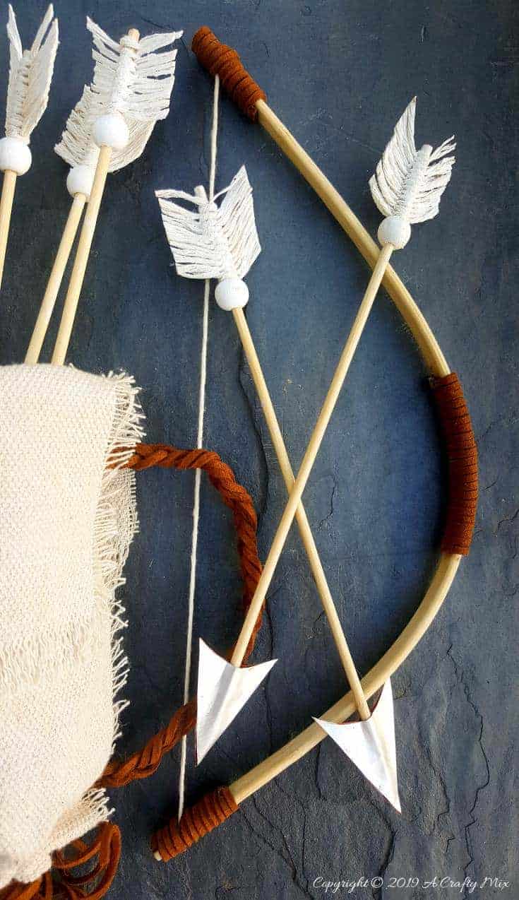 Make this no-sew quiver full of macram&eacute; arrows for Valentine&rsquo;s Day using empty soda cans. It&rsquo;s a fun gift idea and you can use it all year round in your home d&eacute;cor too. It only take an hour to make and you don&rsquo;t need any fancy tools or equipment either. #VintageValentine #TinCanRecycle #ValentineGiftIdea #QuiverArrows #AcraftyMix #HomeDecor #MacrameArrow