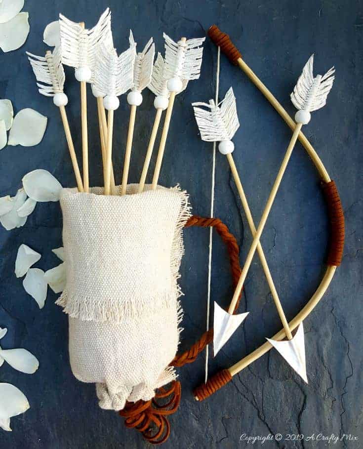 Make this no-sew quiver full of macram&eacute; arrows for Valentine&rsquo;s Day. It&rsquo;s a fun gift idea and you can use it all year round in your home d&eacute;cor too. It only take an hour to make and you don&rsquo;t need any fancy tools or equipment either. #VintageValentine #TinCanRecycle #ValentineGiftIdea #QuiverArrows #AcraftyMix #HomeDecor #MacrameArrow