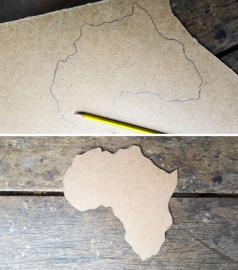 Draw the African continent on board and cut it out with a jigsaw #mixedmedia #mixedmediatutorial #DIYNightLight #ACraftyMix #fauxrust #Africa #HomeDecor