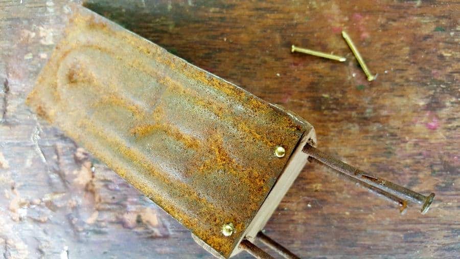 Glue and nail the ceiling tile to the back of the chairs #FairygardenDIY #FairyFurniture #RustyNailFurniture #ACraftyMix #FairyGardenTutorials #CeilingTileRepupose #FairyGardenIdeas