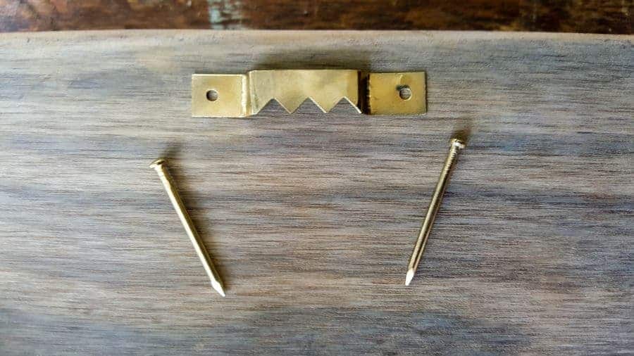 Add a saw tooth hanger on the back of the Scotty Leash Holder #DIYDogLeash #Leashholderideas #WoodLeashHolder #ACraftyMix #FreePrintable #ScottishTerrier #PetLeashHolder #DIYLeashHolder