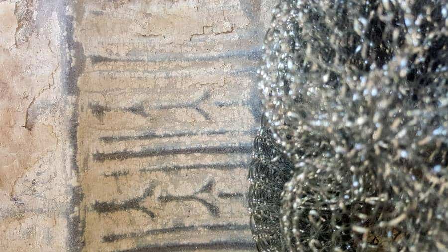 Scrub the ceiling tiles with steel wool to expose the pattern #FairygardenDIY #FairyFurniture #RustyNailFurniture #ACraftyMix #FairyGardenTutorials #CeilingTileRepupose #FairyGardenIdeas