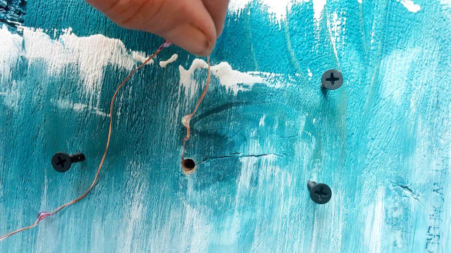Thread the fairy lights through the hole. #mixedmedia #mixedmediatutorial #DIYNightLight #ACraftyMix #fauxrust #Africa #HomeDecor
