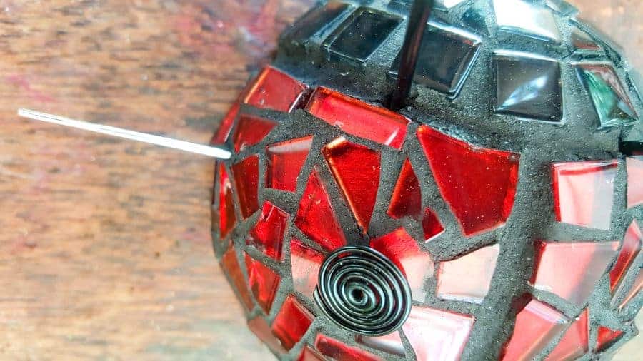 Use a sewing needle to make a hole for the jewelry wire spots #LadyBugcrafts #LadyBugIdeas #LadyBugDIY #ACraftyMix #Ladybugmosaic #LadyBird #LadyBugCrafts #LadyBirdCrafts