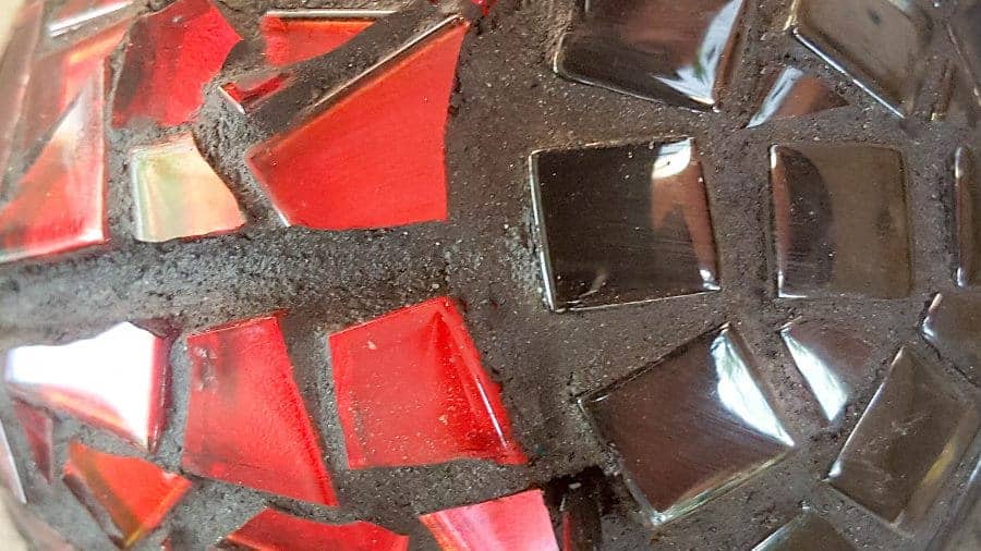 Wipe the grout off with a damp rag or cloth #LadyBugcrafts #LadyBugIdeas #LadyBugDIY #ACraftyMix #Ladybugmosaic #LadyBird #LadyBugCrafts #LadyBirdCrafts