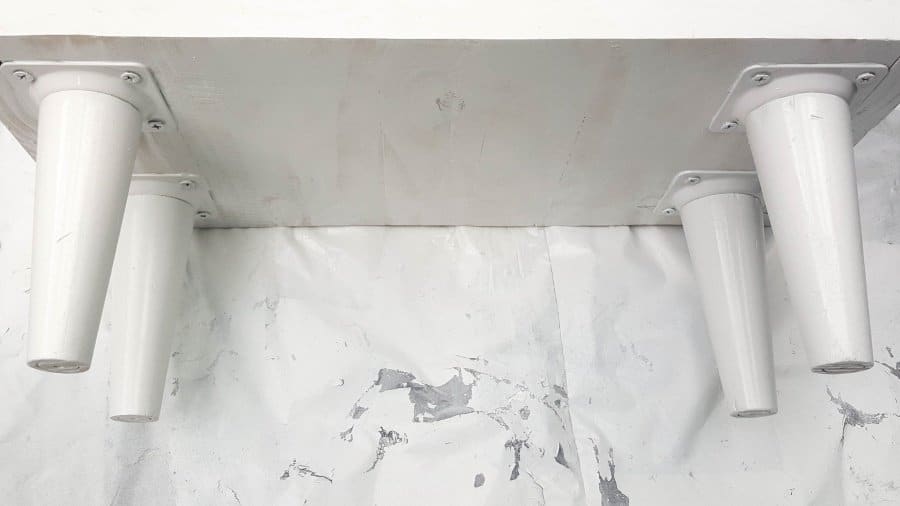 Add a few legs to give the cabinet some height #ChinoiserieDecor #VinylTile #EasyMakeOver #HomeDecorDIY #chinoiserietiles #ACraftyMix #blueandwhitedecor #chinoiseriechic #VinylTileDecor #DIYTutorial