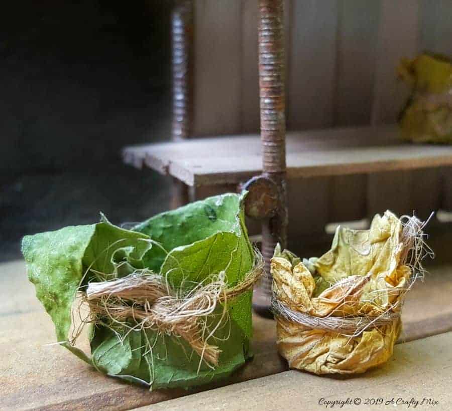 Add a few fairy leaf planters and bowls to complete the look #FairyPottingBench #FairyDIYCrafts #ACraftyMix #FairyGardens #FairyCrafts #WhimsicalFairyCrafts #SimpleFairyCrafts #MiniaturePottingBench