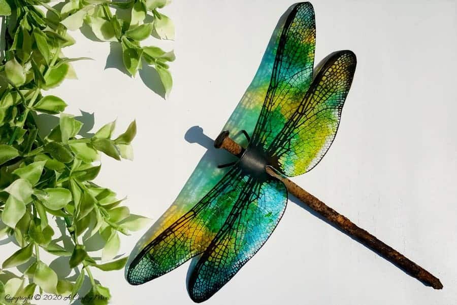 A rusty nail has never looked more gorgeous with these translucent dragonfly wings. Full tutorial includes 2 free printables to make dragonfly and butterfly wings. #DragonflyWingsTempalte #DragonflyWingsDIY #ButterflyWings #ACraftyMix #DIYDragonfltWings #AlcoholInkCrafts #AlcoholInk #CraftTutorial