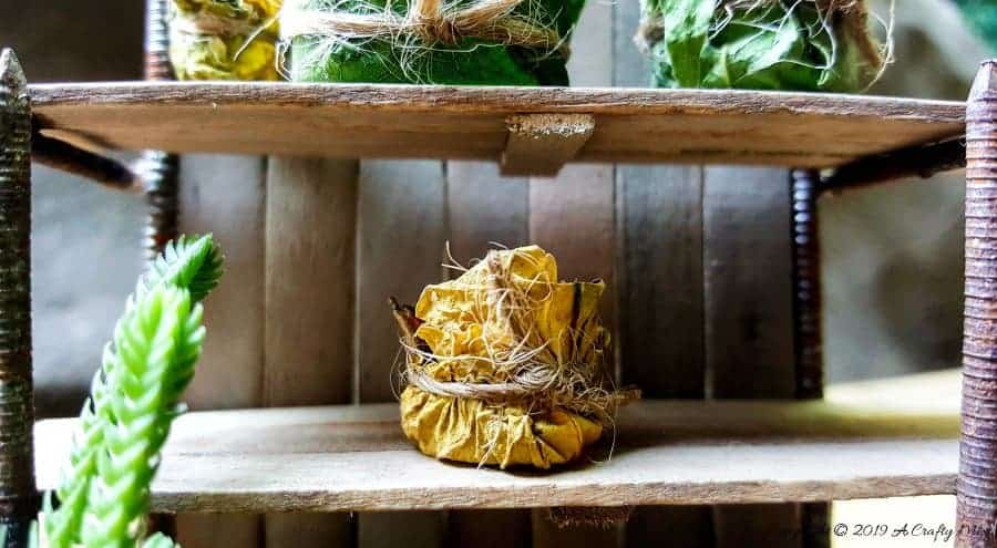 Add a few fairy leaf planters and bowls to complete the look #FairyPottingBench #FairyDIYCrafts #ACraftyMix #FairyGardens #FairyCrafts #WhimsicalFairyCrafts #SimpleFairyCrafts #MiniaturePottingBench