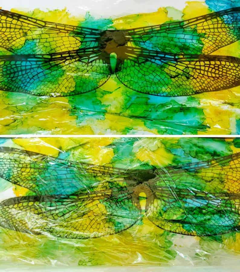 Squish the shrink wrap before sticking the clear film down onto the shrinkwrap #DragonflyWingsTemplate #DragonflyWingsDIY #ButterflyWings #ACraftyMix #DIYDragonflyWings #AlcoholInkCrafts #AlcoholInk #CraftTutorial
