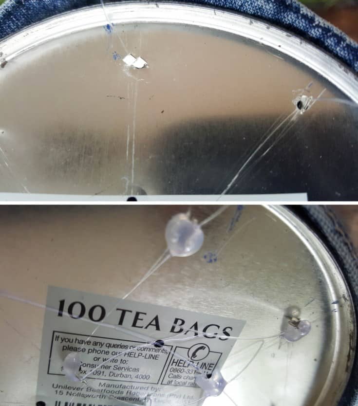 Thread the fishing line through the holes made earlier and secure with hot glue #DIYDenim #DenimIdeas #DenimMobile #DenimUpcycleIdeas #ACraftyMix #DenimUpcycle #DIYWindChime #TinCanRecycle #TinCanMobile #DenimWindChime