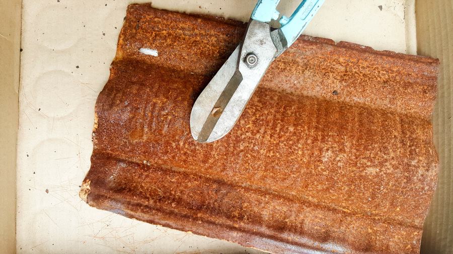 An old rusty ceiling tile can be cut to make some of the more complicated scrap metal letters#Upcycling #Benefits #UpcycleSign #ACraftyMix #RepurposedLetters #RustyAlphabet #UpcycleStrong #InThisTogether #UpcyclingIdeas