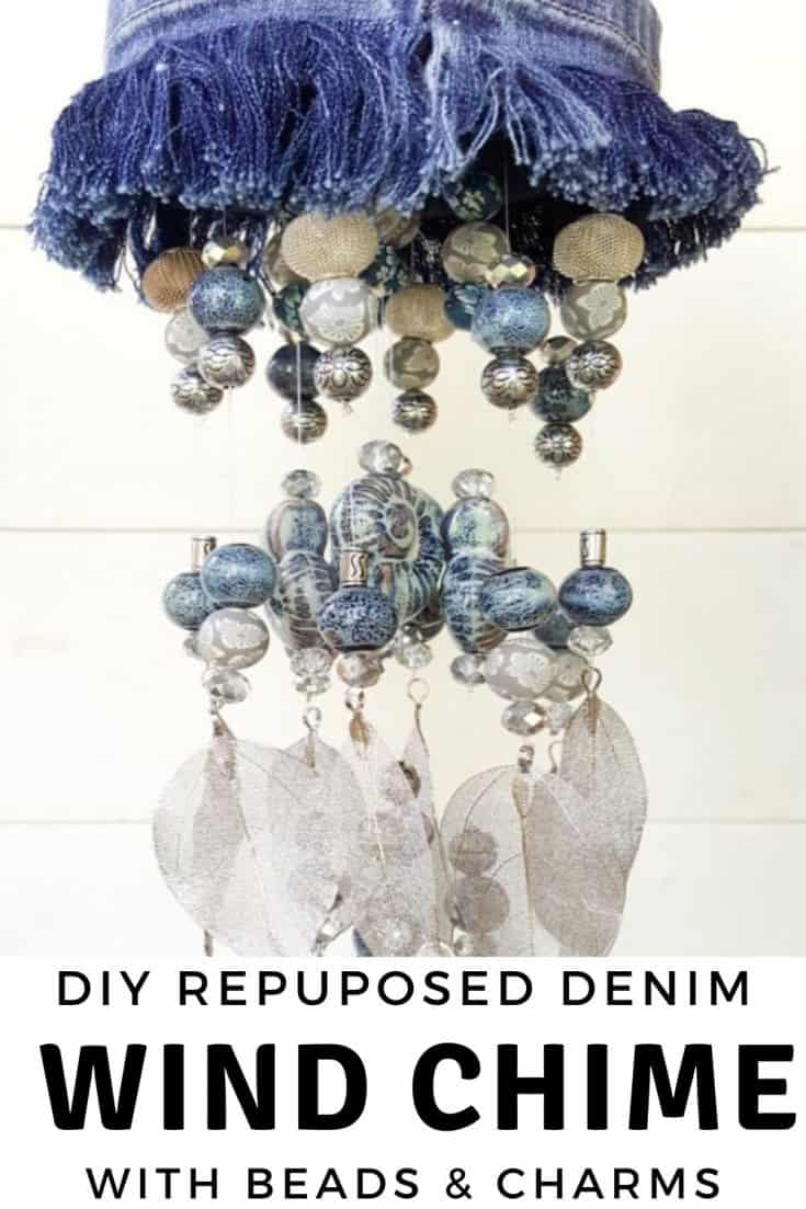 How to make an upcycled denim wind chimes using a tin can and an assortment of beads and metal charms. #DIYDenim #DenimIdeas #DenimMobile #DenimUpcycleIdeas #ACraftyMix #DenimUpcycle #DIYWindChime #TinCanRecycle #TinCanMobile #DenimWindChime