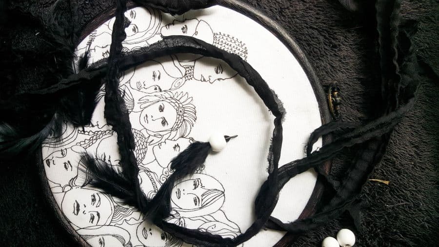 To finish off the paper napkin dream catcher I used fabric strips, beads and feathers #DreamcatcherDIY #Napkinrepurpose #ACraftyMix #InThisTogether #BlackandWhite #HomeDecor #DreamcatcherCraft #TransferAdhesive #PaperNapkinCraft