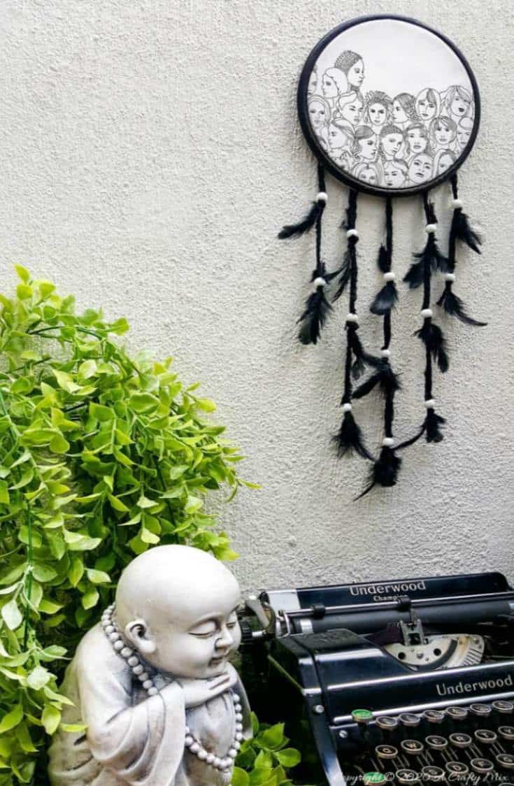 How to make a gorgeous paper napkin dream catcher. Easy craft idea to add to your home decor #DreamcatcherDIY #Napkinrepurpose #ACraftyMix #InThisTogether #BlackandWhite #HomeDecor #DreamcatcherCraft #TransferAdhesive #PaperNapkinCraft
