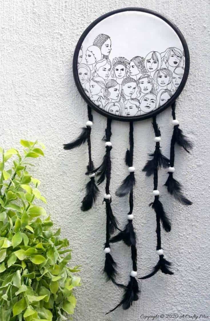 How to make a gorgeous paper napkin dream catcher. Easy craft idea to add to your home decor #DreamcatcherDIY #Napkinrepurpose #ACraftyMix #InThisTogether #BlackandWhite #HomeDecor #DreamcatcherCraft #TransferAdhesive #PaperNapkinCraft