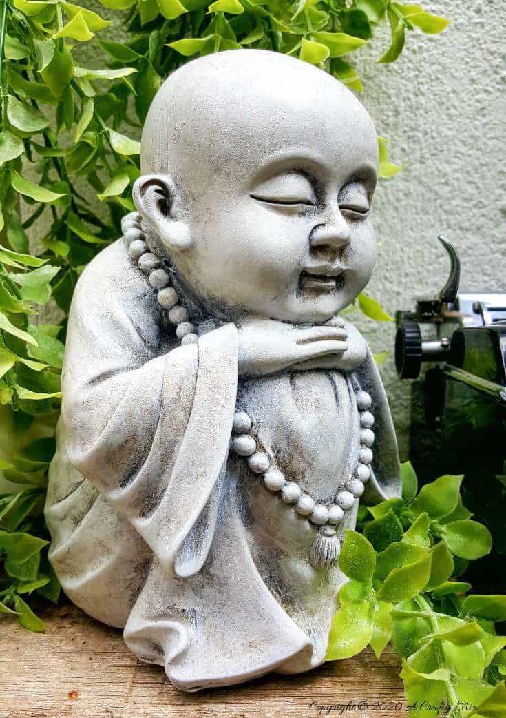 Our cute little Buddha keeps watch over our work #DreamcatcherDIY #Napkinrepurpose #ACraftyMix #InThisTogether #BlackandWhite #HomeDecor #DreamcatcherCraft #TransferAdhesive #PaperNapkinCraft