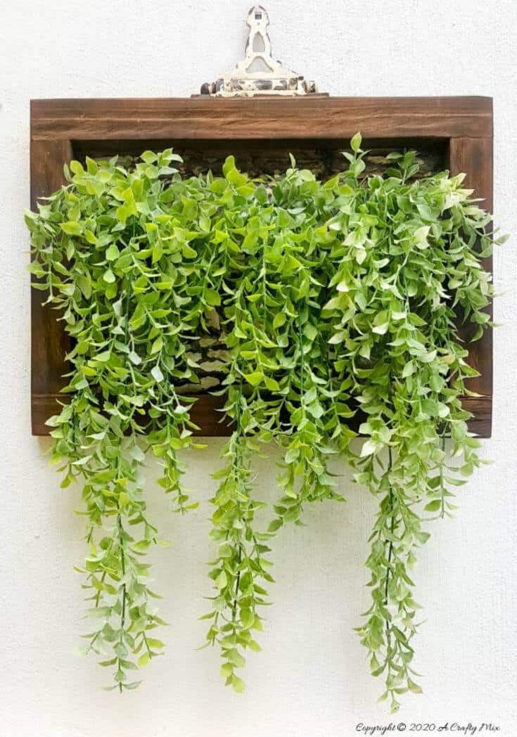 With Spring around the corner, it&rsquo;s time to start getting those outdoor spaces ready. Find out how we transformed a tin ceiling tile into this gorgeous planter and how you can change it into a candle holder with one small twist. #farmhousedecor #rusticdecor #acraftymix #farmstyledecor #springproject #diyhomedecor #ceilingtilerepurpose