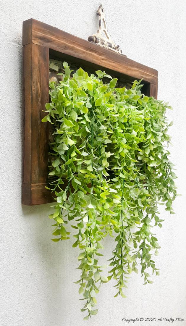 With Spring around the corner, it&rsquo;s time to start getting those outdoor spaces ready. Find out how we transformed a tin ceiling tile into this gorgeous planter and how you can change it into a candle holder with one small twist. #farmhousedecor #rusticdecor #acraftymix #farmstyledecor #springproject #diyhomedecor #ceilingtilerepurpose