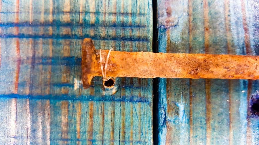 Use fishing line to attach some of the odd shaped scrap metal bits #Upcycling #Benefits #UpcycleSign #ACraftyMix #RepurposedLetters #RustyAlphabet #UpcycleStrong #InThisTogether #UpcyclingIdeas