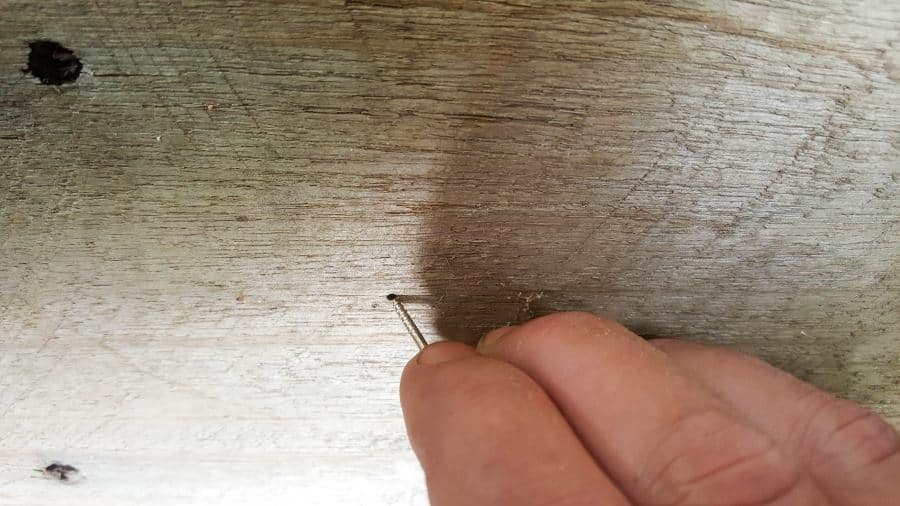 Add a hook to the top of the tier to hang the coconut, bowl or wire cage #DIYBirdFeeder #RecycledBirdFeeder #RusticBirdFeeder #aCraftyMix #Woodenbirdfeeder #PalletBirdFeeder #UniqueBirdFeeder