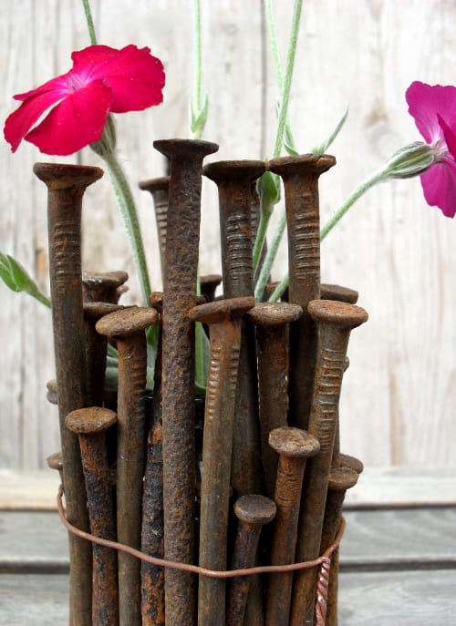 We searched high and low to find the most amazing rusty nail repurpose ideas and tutorials for you. So don&rsquo;t throw them away until you&rsquo;ve seen all the crazy creative things you can do with them. #rustynail #repurpose #recycle #DIYtutorial #acraftymix #repurposetutorials #rustynailideas #rustynailcrafts #repurposednails