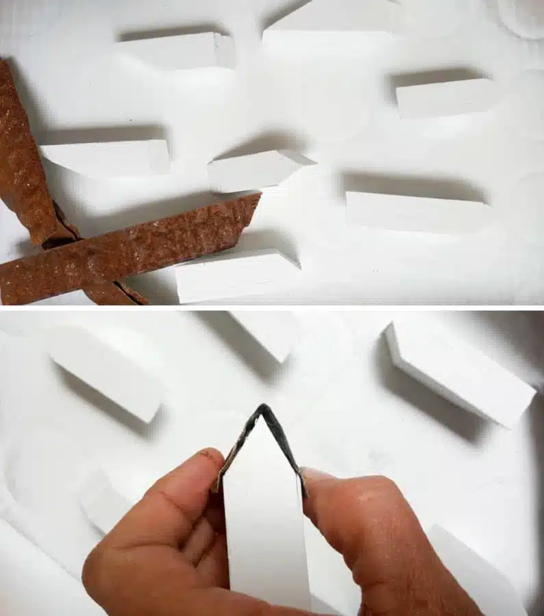 Cut strips of ceiling tiles to make the roof for the buildings #EcoFriendly #Kokedama #FairyVillage #ACraftyMix #EasyGardenCraft #MossBalls #SpekBoom #kokedamaIdeas #StringGarden #IndoorPlants