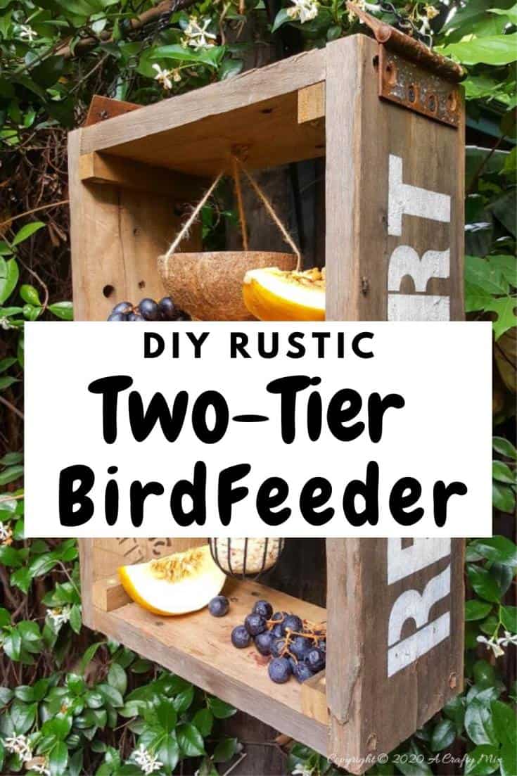 A DIY bird feeder is a great way to make your feathered friends feel at home and look after them when food sources are scarce. This rustic two tier bird feeder is quick to put together and the tiers make it easy to serve them a smorgasbord of treats too. #DIYBirdFeeder #RecycledBirdFeeder #RusticBirdFeeder #aCraftyMix #Woodenbirdfeeder #PalletBirdFeeder #UniqueBirdFeeder