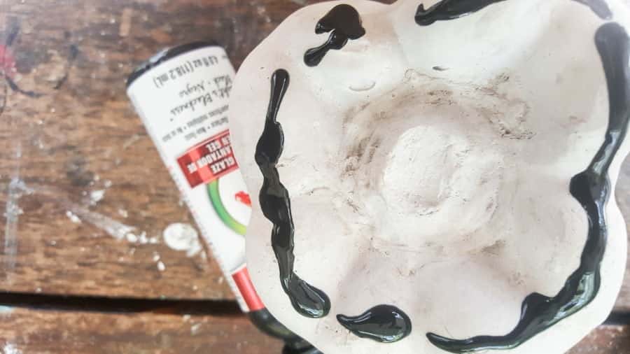 Paint the concrete green pepper with Midnight black to create a base for the next colors