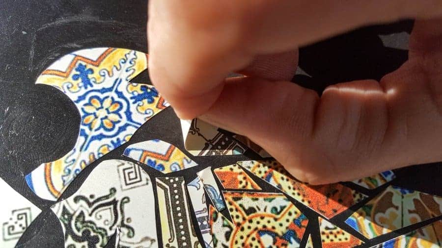 Vinyl tiles are easy to remove if you make a mistake