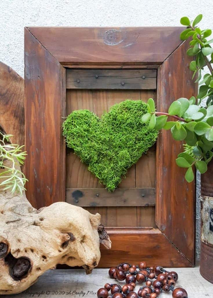 We love using moss in our craft projects, but unfortunately it dries and fades over time leaving your project looking bleh. Here’s an easy way to revive moss for craft projects and get it to look fresh and bouncy again. #tipsandtricks #freshenmoss #acraftymix #revivemoss #crafttutorial