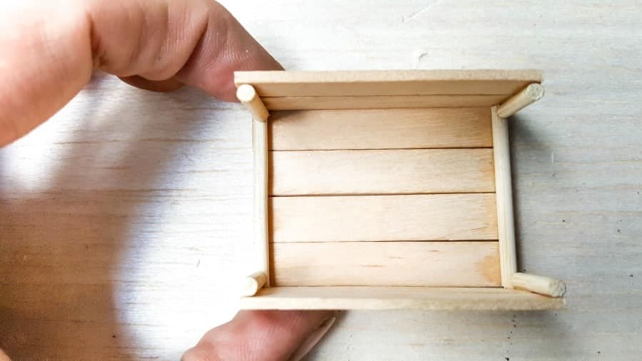 Once the glue sets attach the sides of the crate to the bottom or back
