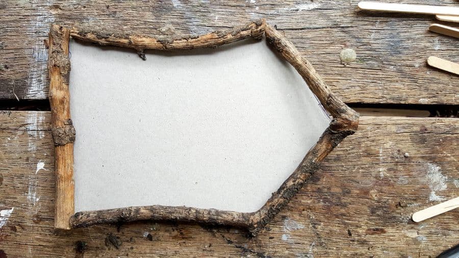 The strengthen the door use cardboard #FairydoorDIY #FairyDoorIdeas #ACraftyMix #MakeAFairyDoor #MiniatureStainedGlass #AlcoholInk