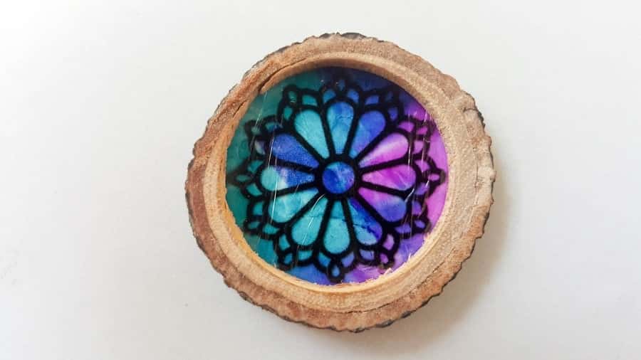 Place the miniature stained glass window in the frame #FairydoorDIY #FairyDoorIdeas #ACraftyMix #MakeAFairyDoor #MiniatureStainedGlass #AlcoholInk
