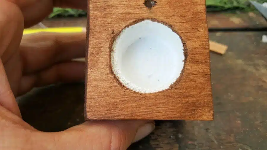 A view from the top of the miniature toilet bowl