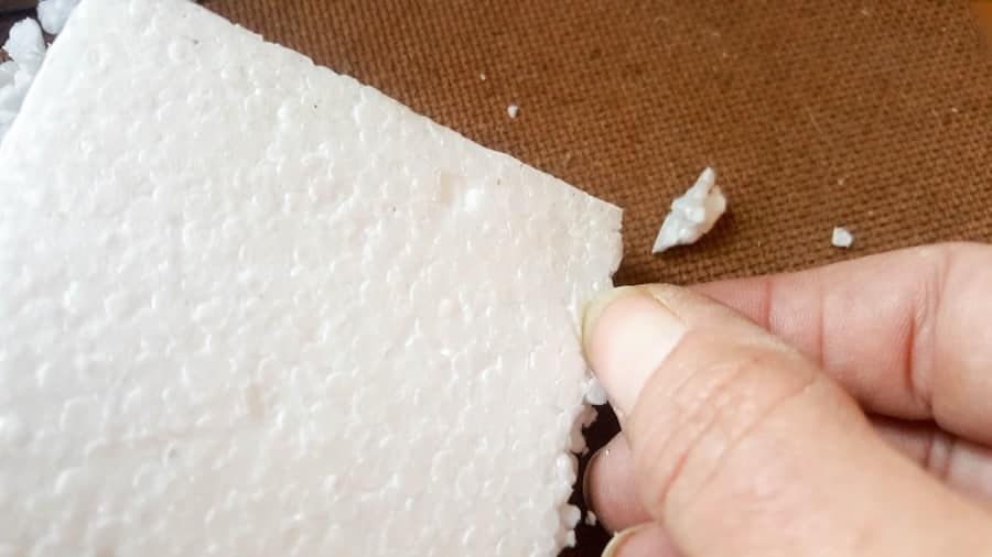 Pick away the edges of the polystrene shapes to distress