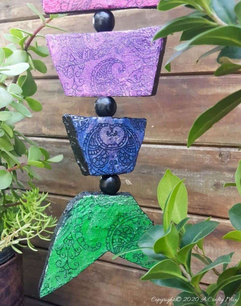 Quirky boho decor is SO easy and inexpensive to make, especially when it comes to this colorful boho fish wall art. The perfect Bohemian wall decor for just a few dollars. #Bohodecor #Bohohome #gallerywallideas #Unicornspitideas #BeachDecory #bohodecor #ACraftymix #EasyCreativeCrafts #kidscraft
