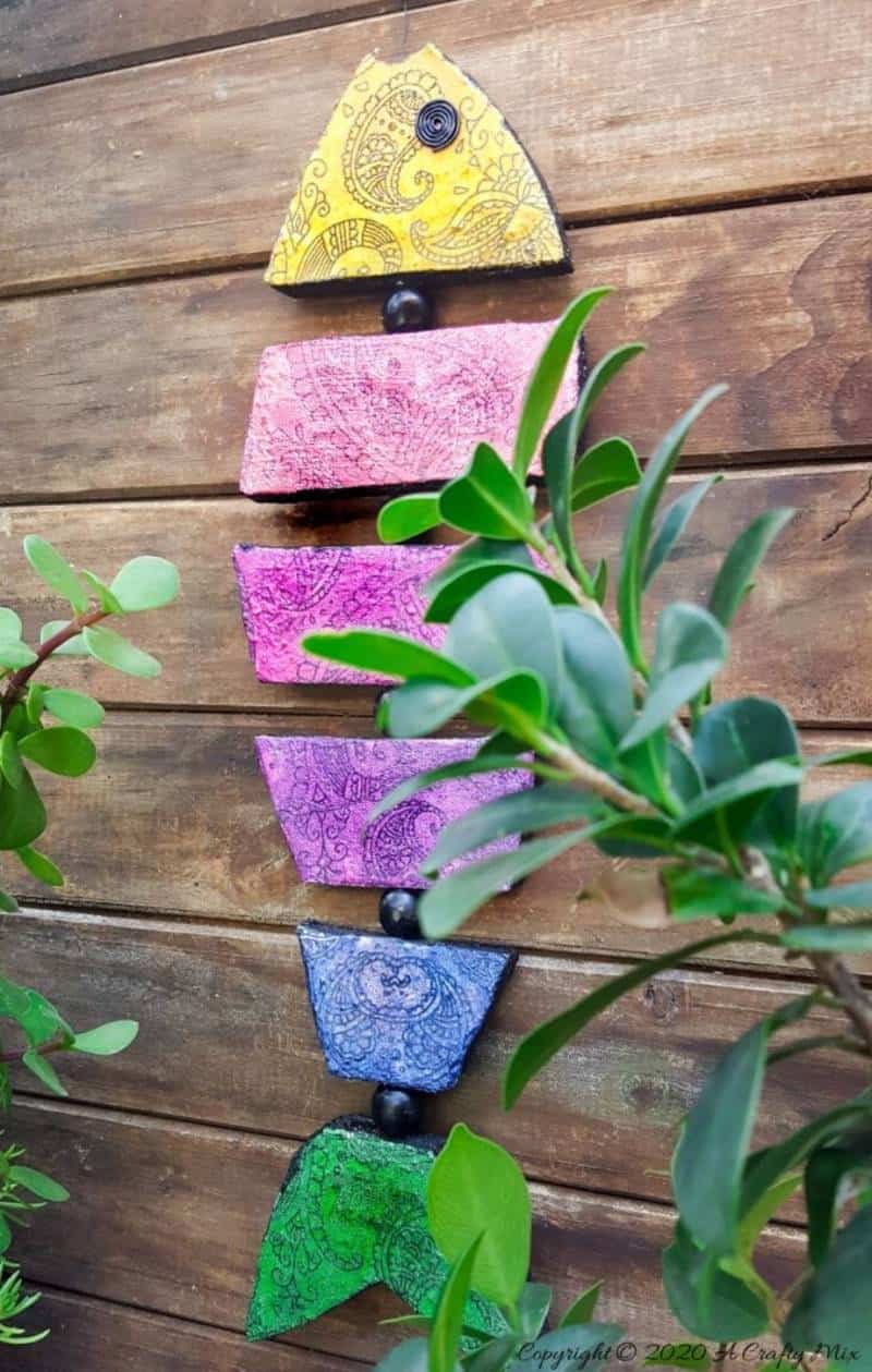 Quirky boho decor is SO easy and inexpensive to make, especially when it comes to this colorful boho fish wall art. The perfect Bohemian wall decor for just a few dollars. #Bohodecor #Bohohome #gallerywallideas #Unicornspitideas #BeachDecor #bohodecor #ACraftymix #EasyCreativeCrafts #kidscraft