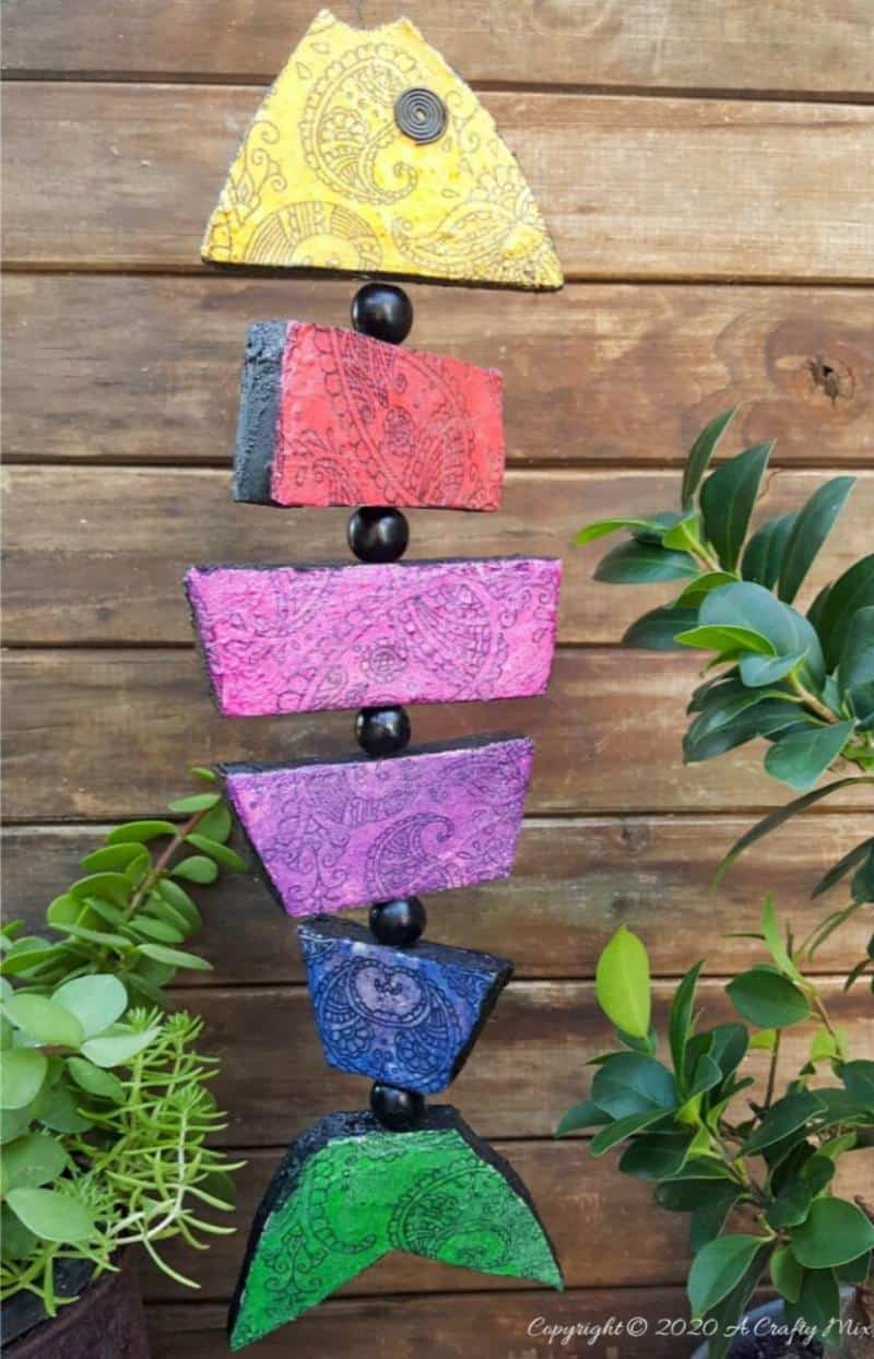 Quirky boho decor is SO easy and inexpensive to make, especially when it comes to this colorful boho fish wall art. The perfect Bohemian wall decor for just a few dollars. #Bohodecor #Bohohome #gallerywallideas #Unicornspitideas #BeachDecor #bohodecor #ACraftymix #EasyCreativeCrafts #kidscraft