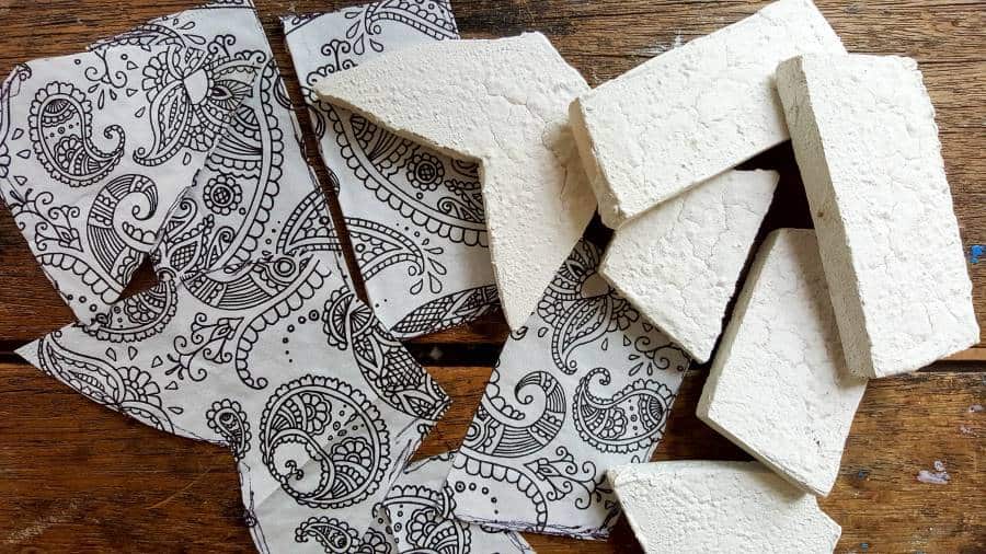 Use the fishy sections to cut the napkin