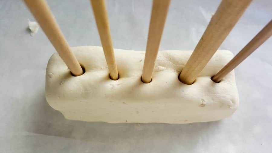 Insert skewers or dowels of various thicknesses into the mold and leave to dry