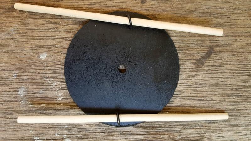 The add the axles to the base, insert the skewers through the eye hooks